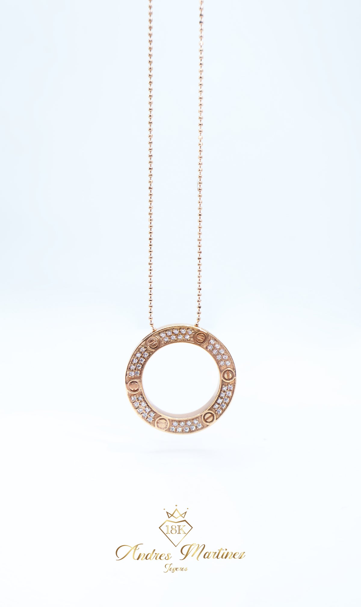 CADENA CON DIJE CIRCULAR ORO ROSA 18K
